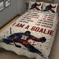 Hockey quilt bedding set displayed on a bed with dynamic player artwork, splatter accents, and bold sports typography
