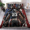 American football quilt bedding styled in a bedroom with bold player artwork and patriotic sports colors