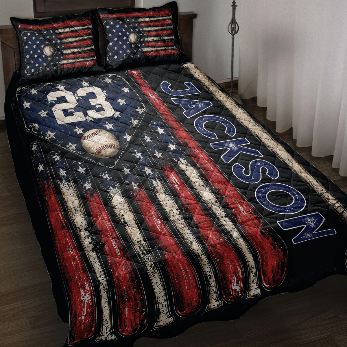 Baseball quilt blanket displayed on a bed with vintage American flag stripes, baseballs, bats, and stars