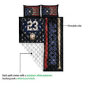 Baseball quilt showing the printed front design and white quilted backing with baseball and bat artwork