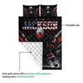 Hockey quilt showing a vivid printed front and white quilted backing