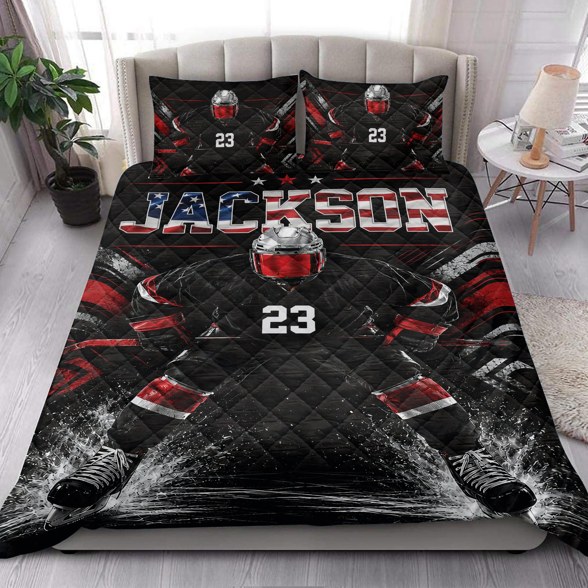 Ice hockey quilt blanket styled in a bedroom with bold black and red sports artwork