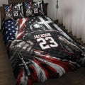 American football quilt blanket displayed on a bed with patriotic stars, red accents, and a helmeted player design