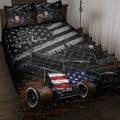 Dirt track racing quilt blanket displayed on a bed with sprint car artwork and patriotic black, gray, and brown tones