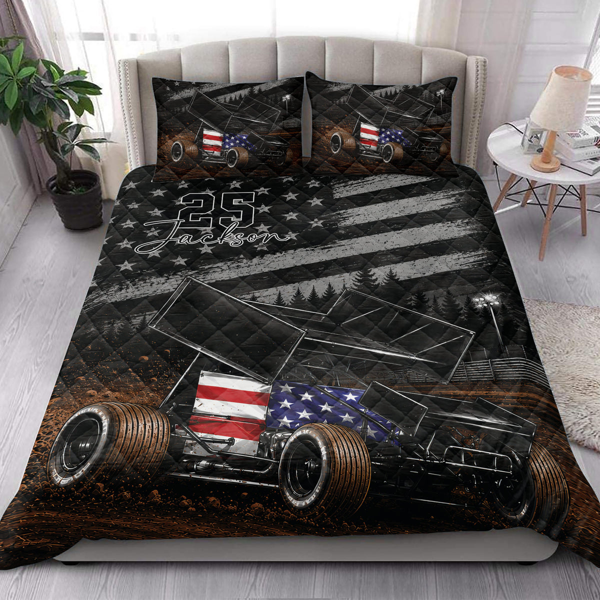 Dirt track racing quilt blanket styled on a bedroom bed with sprint car artwork and bold black racing graphics
