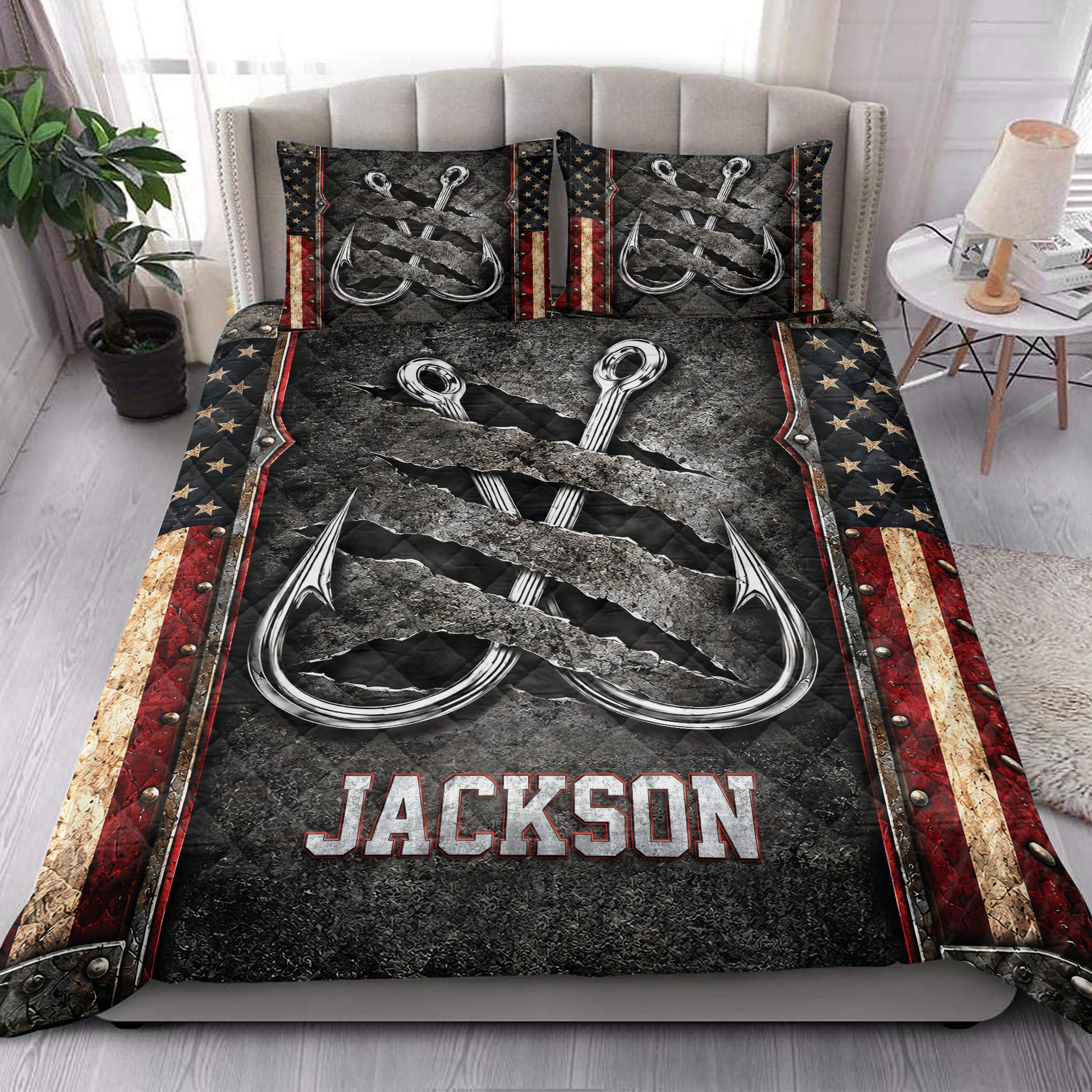 Fishing quilt bedding styled in a bright bedroom with matching hook artwork across the bed and pillows