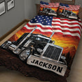 Close-up semi-truck quilt blanket with American flag pattern, mountains, and bold trucking artwork
