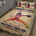 Softball quilt bedding displayed from an angled bedroom view with vibrant pitcher artwork