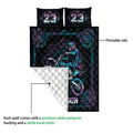 Motocross quilt showing the vibrant printed side and white quilted backing