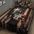 Close view of football quilt blanket featuring a helmeted player, oval football, stars, and distressed flag-inspired artwork