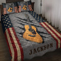 Guitar quilt bedding set displayed on a bed with acoustic guitar artwork, stars, and distressed flag colors