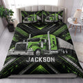 Green semi-truck quilt blanket styled on a bedroom bed with matching pillowcases