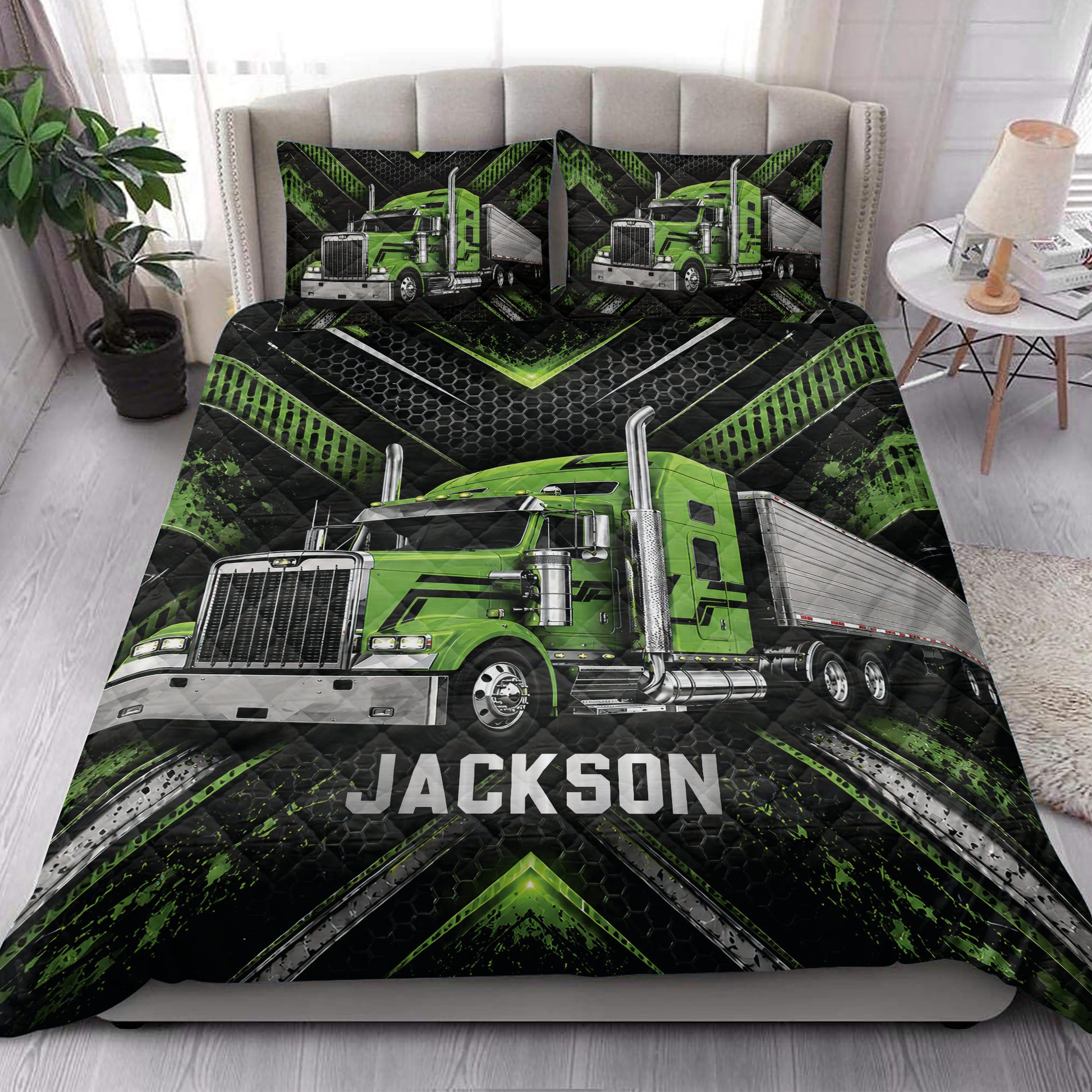 Green semi-truck quilt blanket styled on a bedroom bed with matching pillowcases
