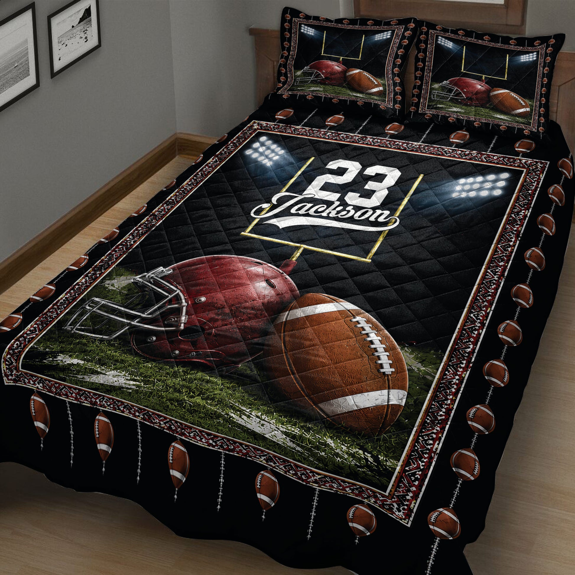 Close view of black football quilt bedding with helmet, football, field, and stadium border design