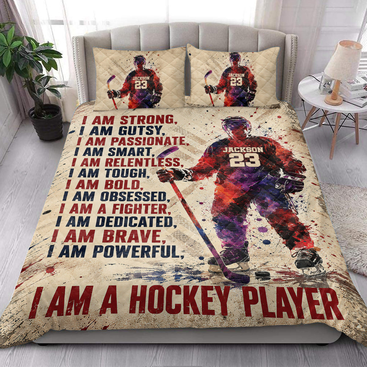 Hockey quilt bedding styled in a bright bedroom with ice hockey player artwork and bold sports typography