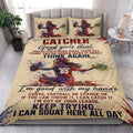 Softball catcher quilt bedding styled in a bright bedroom with colorful player artwork