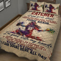 Softball catcher quilt blanket shown on a bedroom bed with vibrant red, blue, and purple artwork