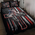 Motocross quilt bedding set displayed on a bed with dirt bike rider artwork in black, red, white, and blue