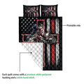 Motocross quilt showing the printed rider artwork and white quilted backing in a construction detail view