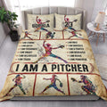 Softball quilt blanket styled on a bedroom bed with colorful player illustrations, baseball stitching, and motivational typography