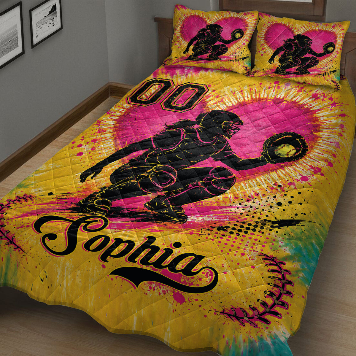 Angled bedroom view of a colorful softball quilt blanket with catcher and softball design