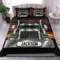 Trucker quilt bedding styled in a bedroom with a large green semi truck and matching truck artwork