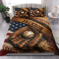 Baseball quilt bedding set styled in a bright bedroom with glove, ball, and star artwork