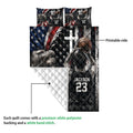 Basketball quilt shown with its printed front and white quilted backing for a close-up construction view