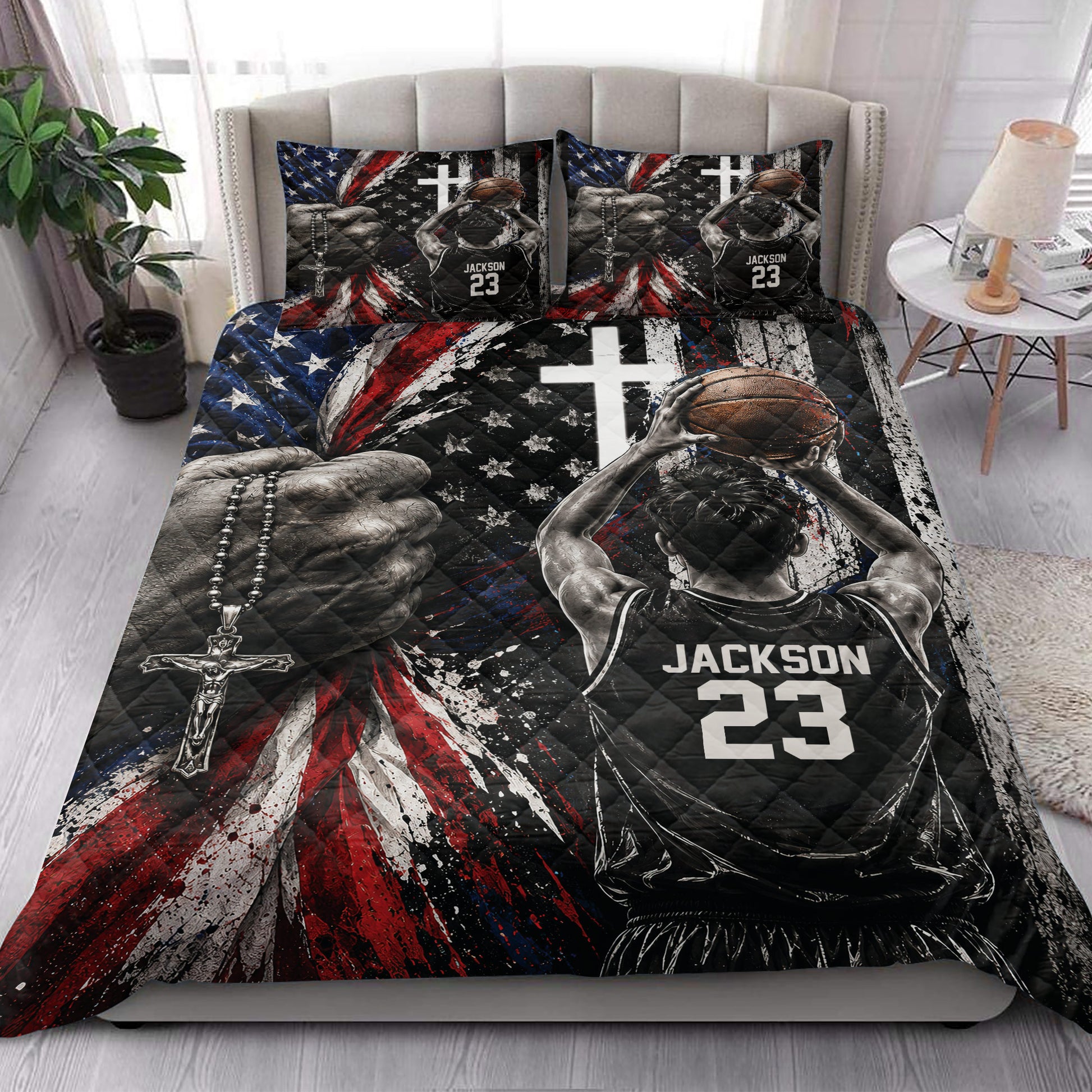 Basketball quilt blanket styled on a bedroom bed with bold black, red, white and blue sports artwork