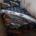 Dirt track racing quilt blanket displayed on a bed with sprint cars, checkered flags, and blue black artwork
