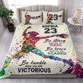 Colorful softball player quilt blanket styled in a bright bedroom with matching sports artwork