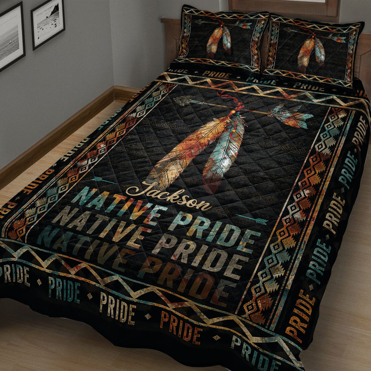 Native-inspired feather quilt blanket displayed on a bed with arrows, geometric borders, and colorful Native Pride artwork