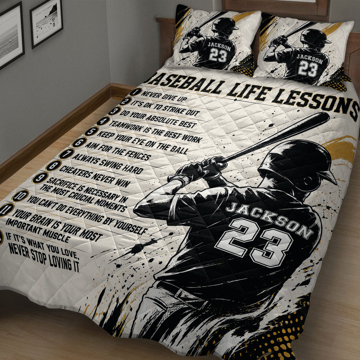 Close view of a baseball quilt blanket featuring a batter illustration, motivational sports messages, and gold accents