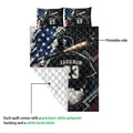 Baseball quilt showing its printed front design and white quilted reverse