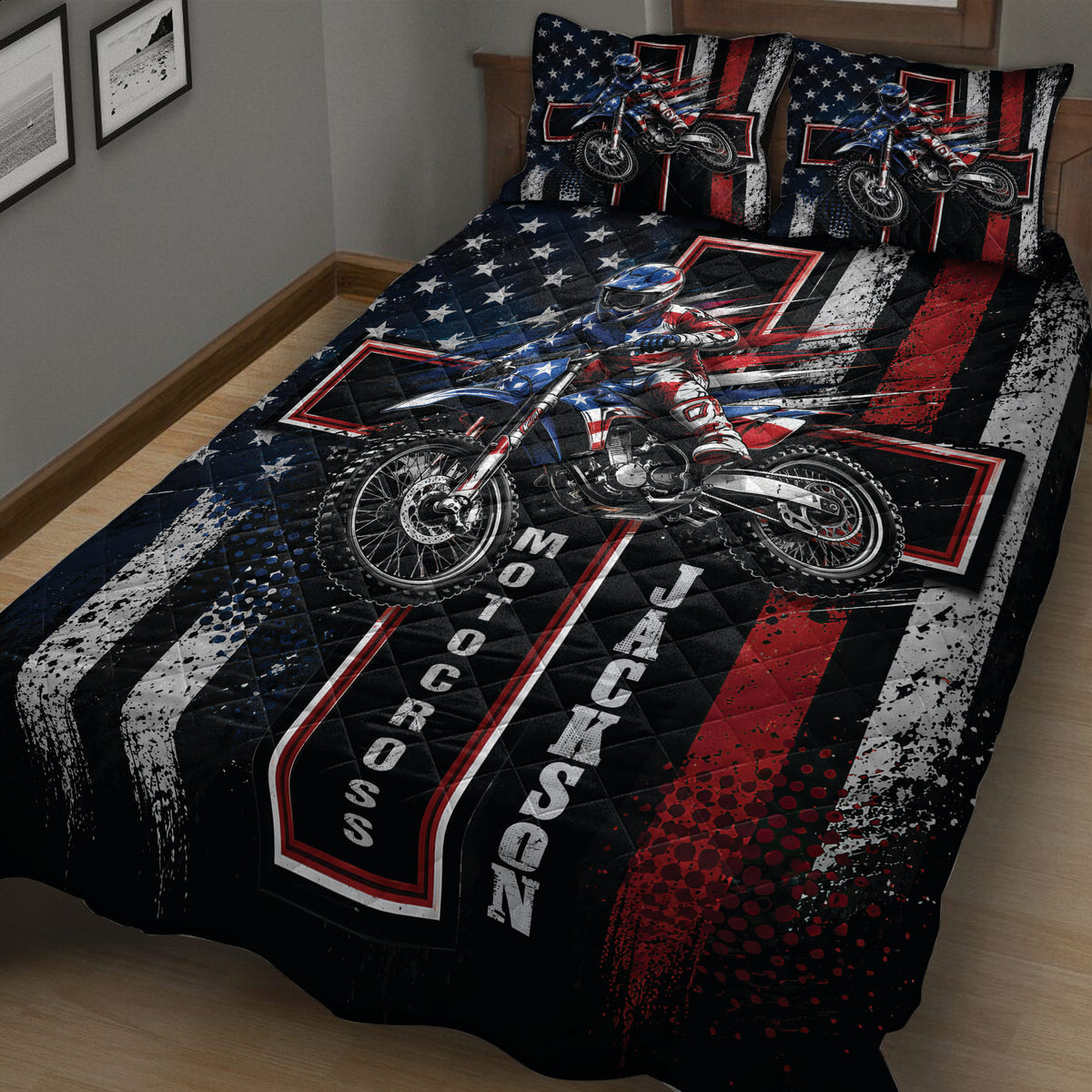 Close bedroom view of a motocross quilt blanket with dirt bike artwork and bold patriotic colors