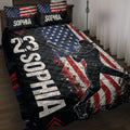 Softball quilt blanket displayed on a bed with patriotic stars, stripes, and batter artwork