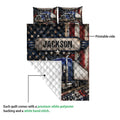 Trucker quilt detail showing printed semi-truck artwork, quilted backing, and a distressed patriotic design