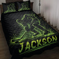 Black quilt bedding set with neon green ice hockey player artwork displayed on a bedroom bed