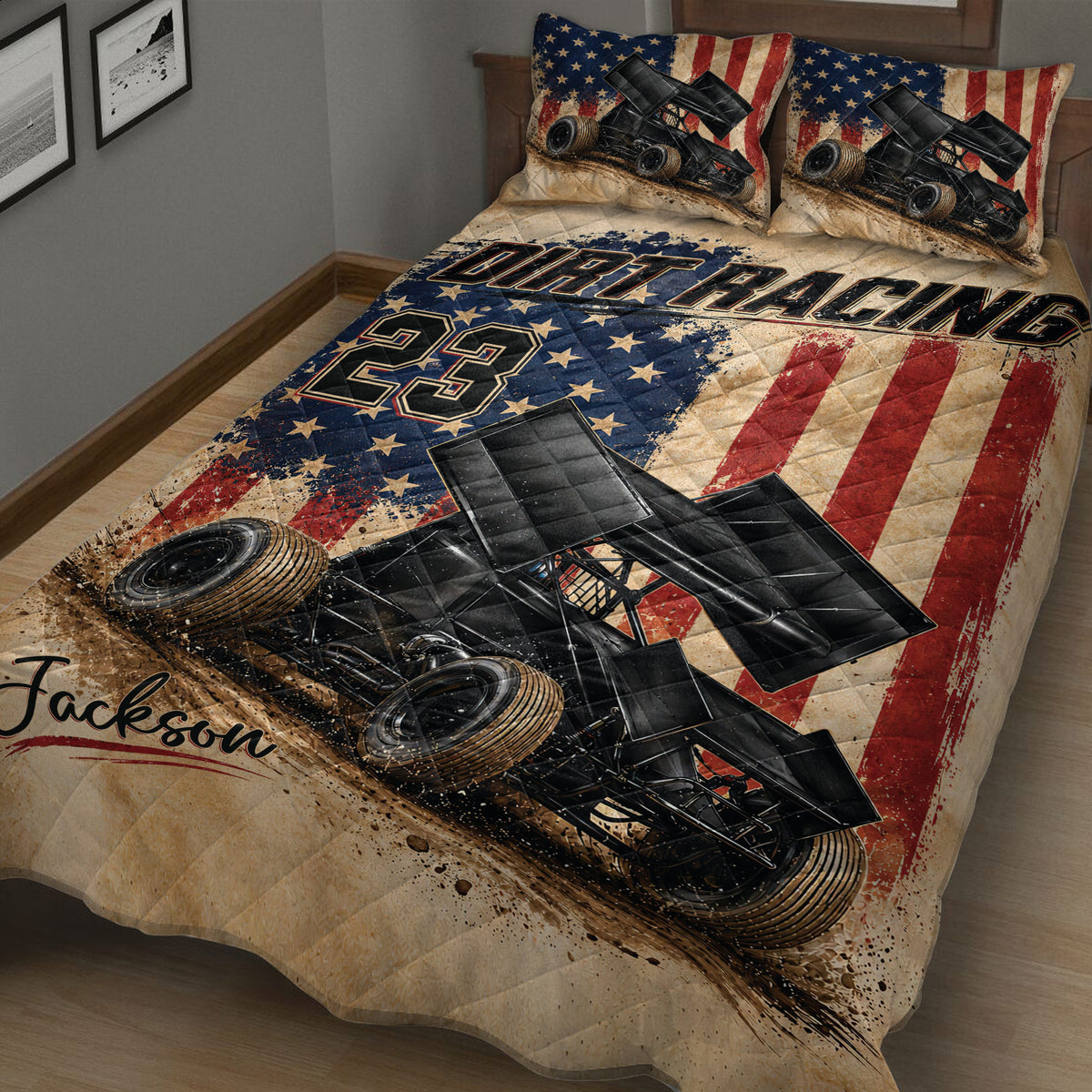 Close view of dirt track racing quilt with sprint car illustrations, racing graphics, and star-spangled artwork
