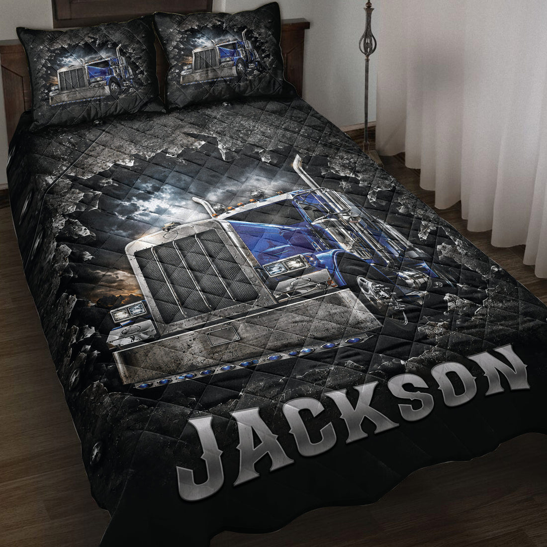 Trucker quilt blanket displayed on a bed with blue semi-truck artwork in a dramatic black and blue design