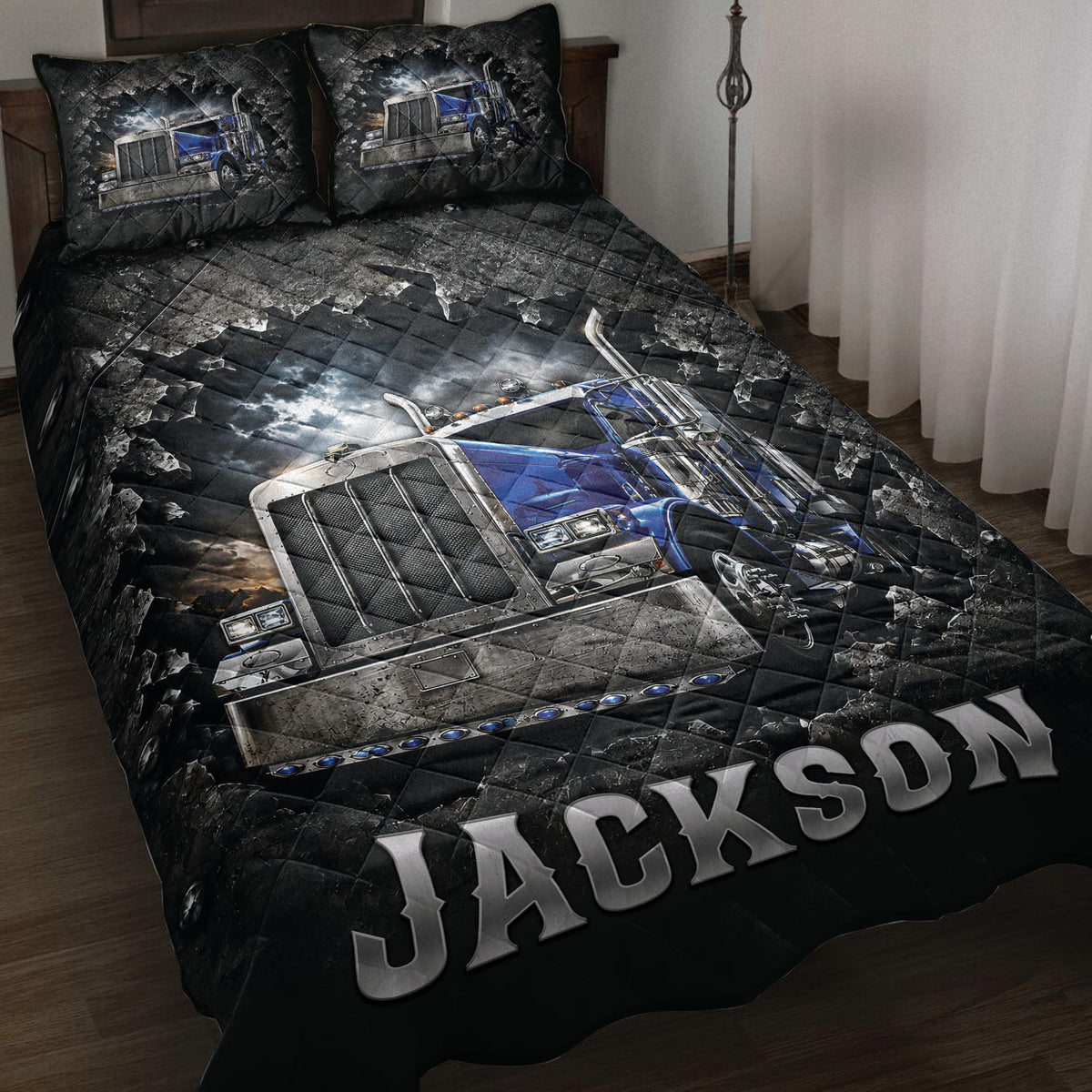 Trucker quilt blanket displayed on a bed with blue semi-truck artwork in a dramatic black and blue design