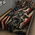 Angled bedroom view of a motocross quilt blanket featuring a helmeted dirt bike rider and dramatic red, black, and cream artwork.