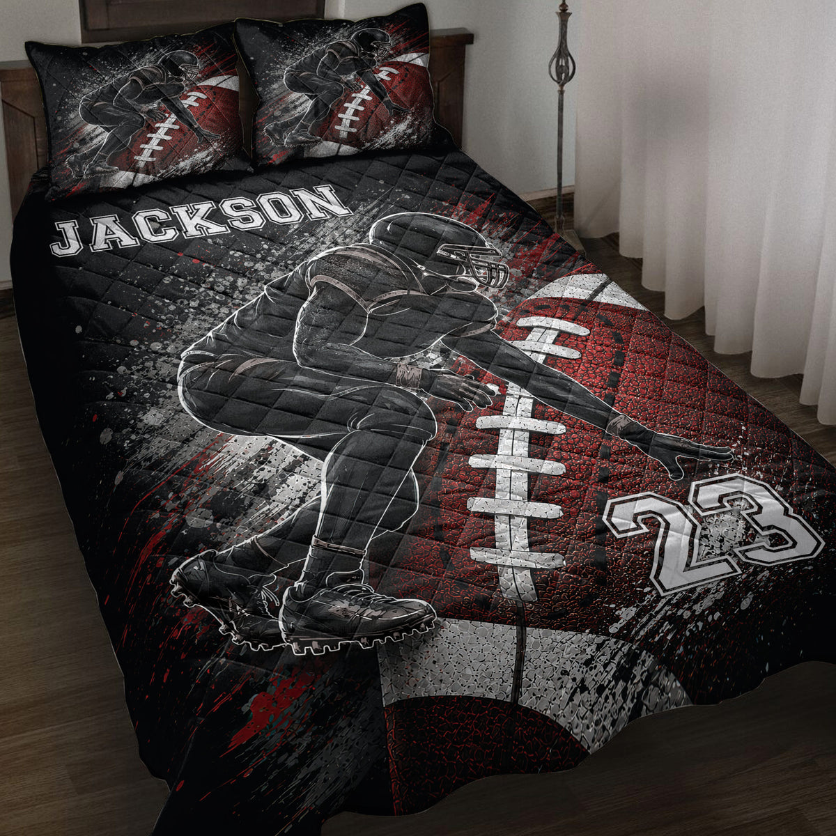 Black and red football quilt blanket displayed on a bed with football player artwork