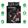 Football quilt bedding set with bold black and red artwork and breathable care feature icons