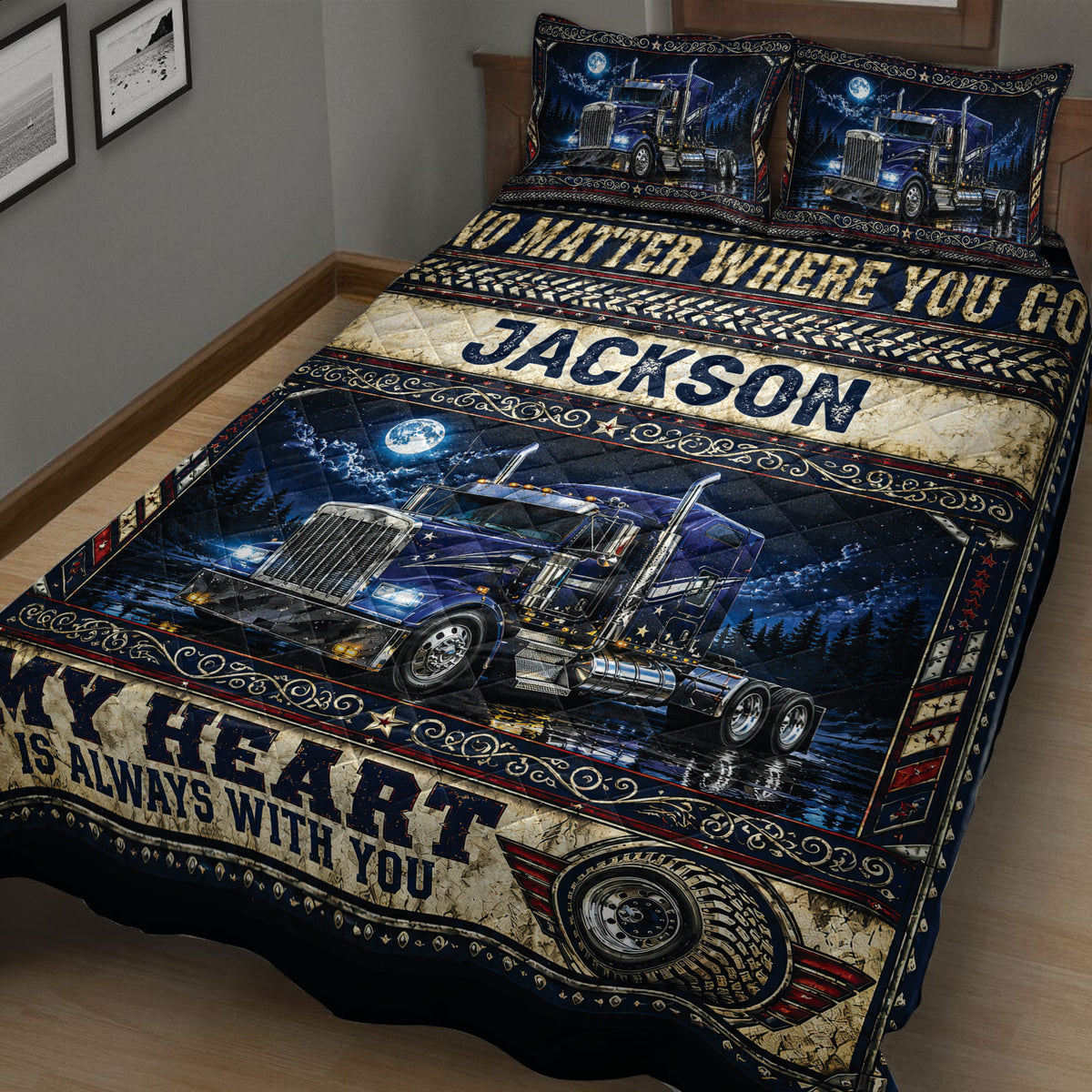 Angled bedroom view of a semi-truck quilt blanket featuring nighttime road artwork and bold decorative panels