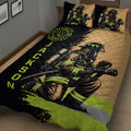 Close bedroom view of a firefighter quilt blanket featuring rescue gear and fire department artwork