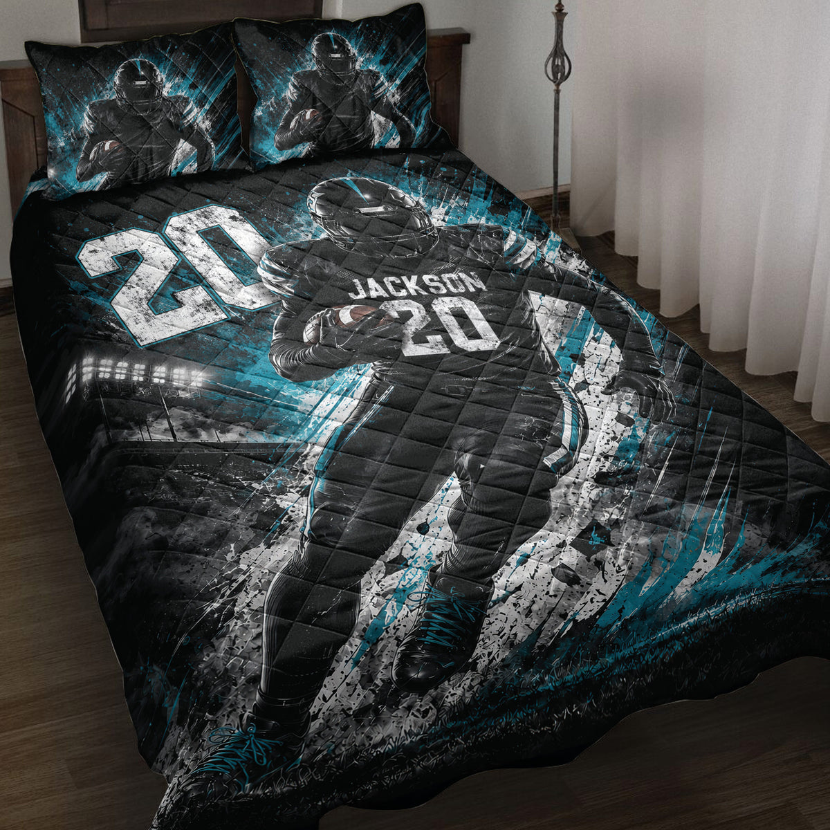 Black and teal football quilt blanket displayed on a bed with player artwork and matching sports-themed pillows