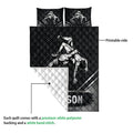 Wrestling quilt close-up showing printed grappling artwork and white quilted backing