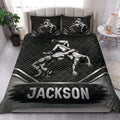 Wrestling quilt bedding set styled in a bright bedroom with bold black-and-white athlete artwork