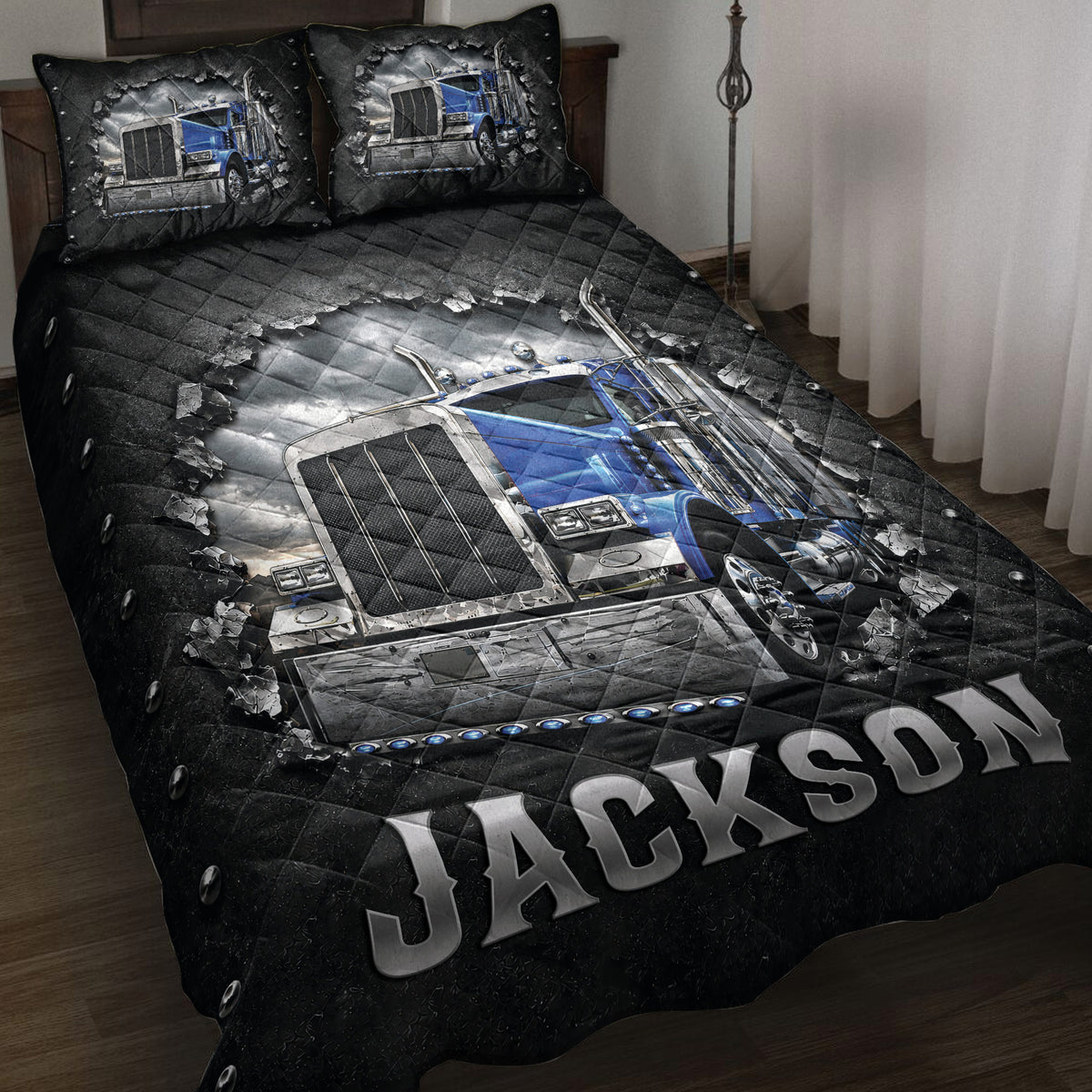Trucker quilt bedding set displayed on a bed with a blue semi truck, black diamond pattern, and dramatic metallic artwork
